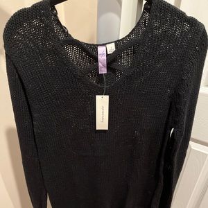 Tag on Francesca’s crochet sweater